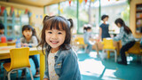 Little preschooler in the background of a classroom