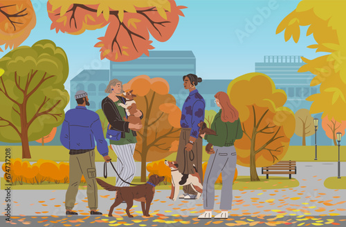 Owners walking dogs in park zone. Large public garden, land area with autumn yellow grass and trees. People are walking along road grandmother with doggy, man and woman, girl teenager with puppy
