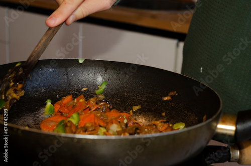 sauteed vegetables in full preparation in the kitchen