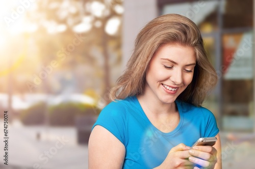 Happy young woman check smartphone,