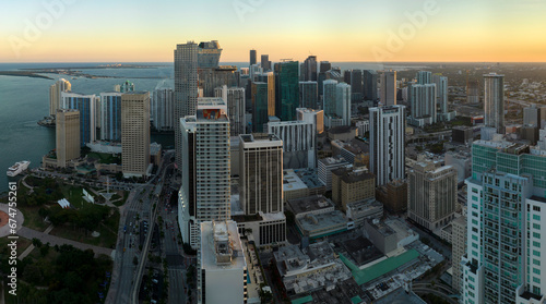 Aerial view of downtown district of of Miami Brickell in Florida  USA at sunset. High commercial and residential skyscraper buildings in modern american megapolis
