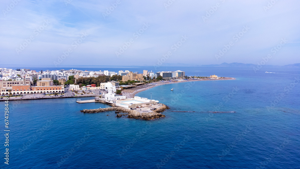 Mandraki port of Rhodes city harbor and Elli beach a popular summer tourist destination, aerial panoramic view in Rhodes island in Greece