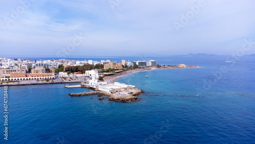 Mandraki port of Rhodes city harbor and Elli beach a popular summer tourist destination, aerial panoramic view in Rhodes island in Greece