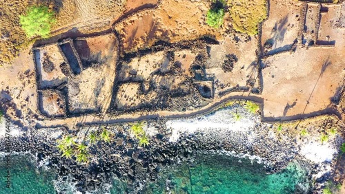 Aerial drone view of the ruins of the ancient Hawaiian village at Lapakahi State Historical Park, Hawaii Island, Hawaii. photo