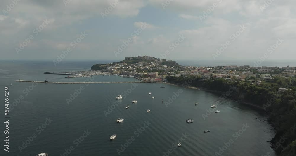 Aerial view of the harbour and the port in Procida Island, Flegree Islands archipelagos, Naples, Campania, Italy. Aerial view of the harbour and the port in Procida Island, Flegree Islands archipelagos, Naples, Campania, Italy.