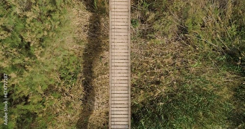 Aerial view of suspension bridge over a dry stream, HaBesor, Israel. photo