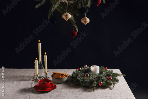 winter holidays and celebration concept - close up of christmas wreath, ginge...