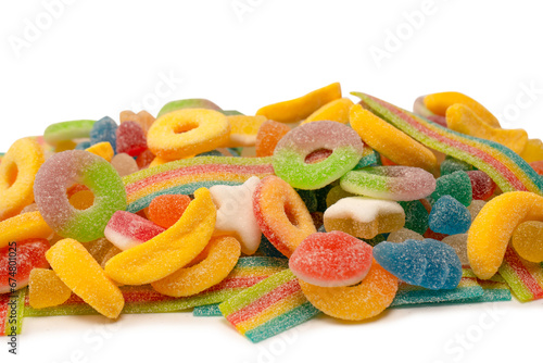 Assorted gummy candies isolated on a white background. Top view.