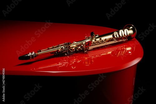 Quadro em tela Straight Soprano saxophone on the surface of a red piano