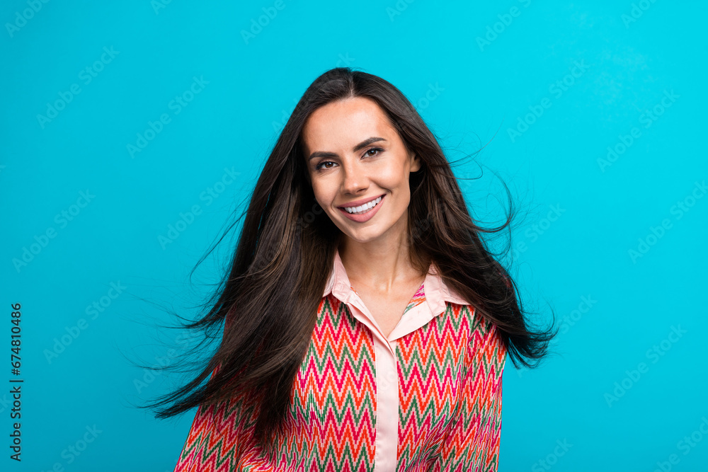 Photo of adorable beautiful model girl hair flying air shampoo ad ads adv wearing vintage blouse isolated teal blue color background Photo of adorable beautiful model girl hair flying air shampoo ad ads adv wearing vintage blouse isolated teal blue color background
