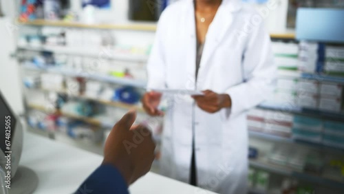 Pharmacy, medicine and customer with prescription for pharmacist at a dispensary with help, advice or treatment. Pharma, retail and hands of people at a counter for drug store purchase, trust or care photo