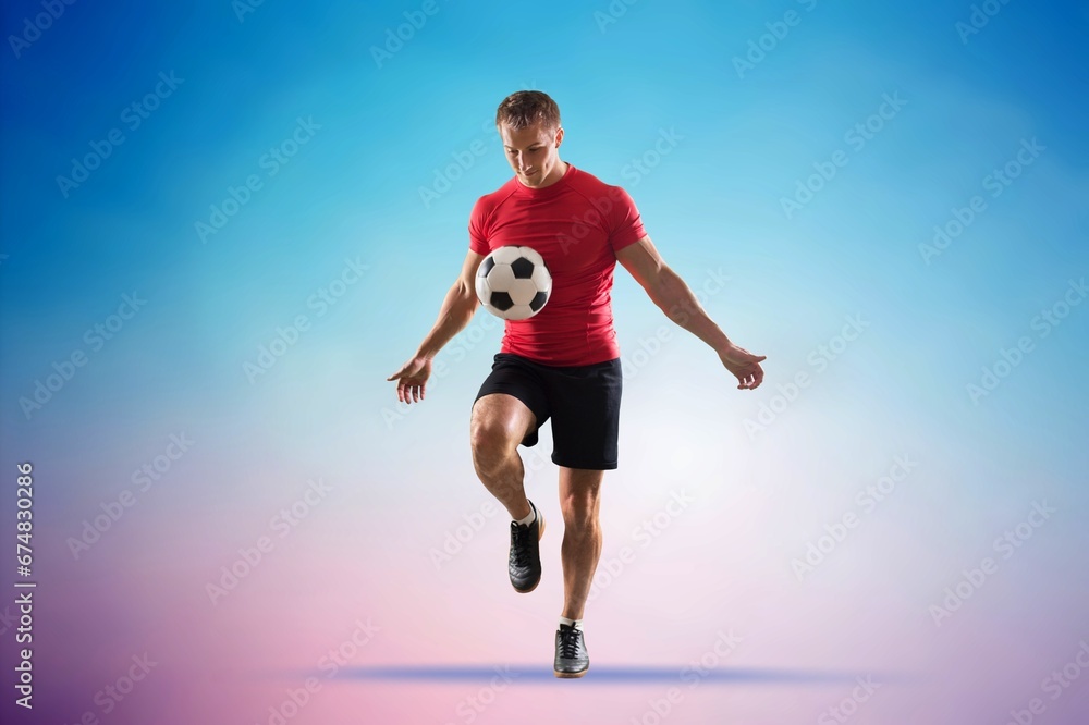 Portrait of young sporty man, a professional football player
