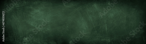 Chalk rubbed out on green chalkboard background