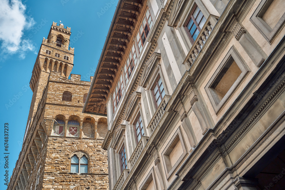 On the left Palazzo Vecchio and its tower, on the right the Uffizi Museum in Florence
