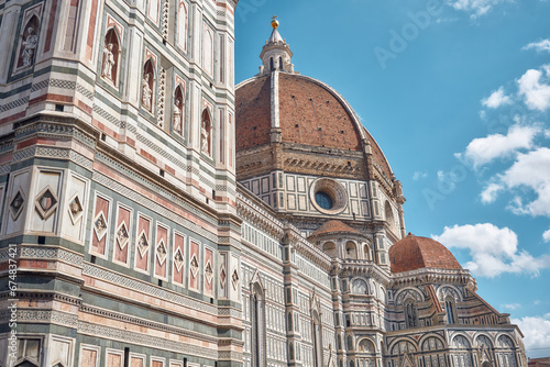 Brunelleschi's dome of the cathedral of Santa Maria del Fiore, on the left a detail of Giotto's bell tower in Florence