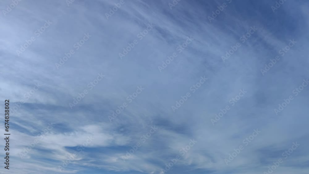 Cirrus covered sky in the middle of the afternoon Cirrus covered sky in the middle of the afternoon