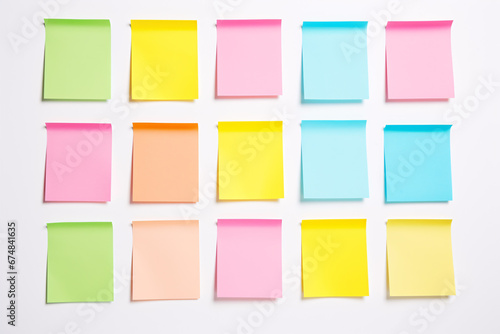 Isolated white background featuring shiny paper office stickers.