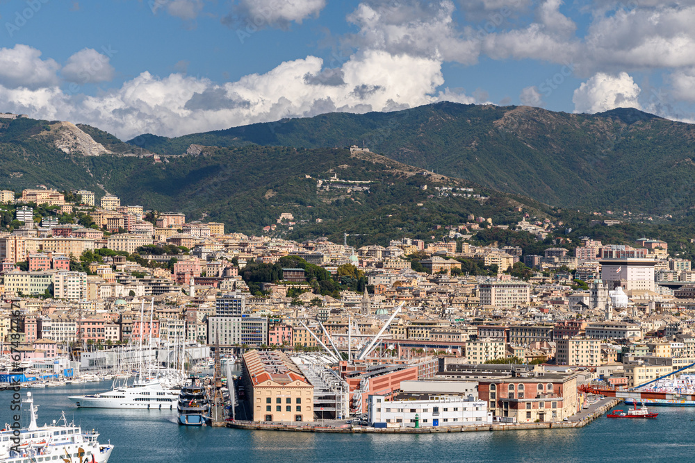 Panoramic view of Genoa downtown with surrounding hills in the background