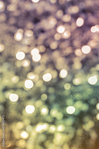 green, violet and golden blurred neutral bokeh background