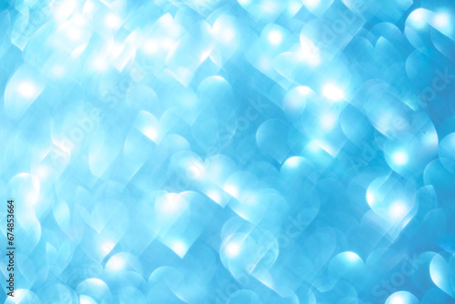 turquoise blue blurred neutral bokeh background with heart shape