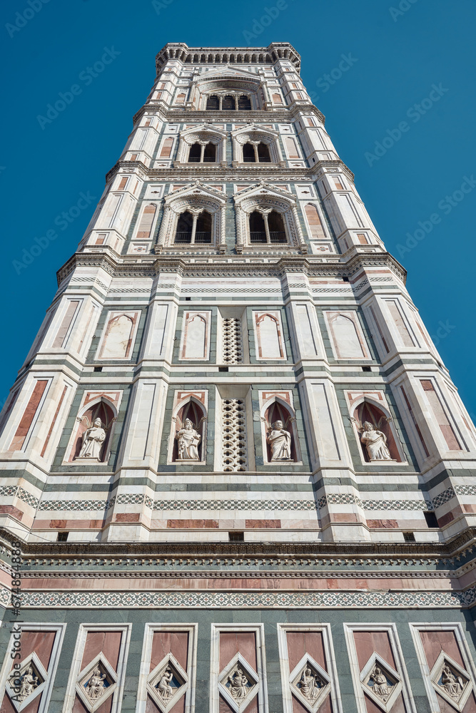 Giotto's bell tower seen from below with contrasting blue sky in Florence Giotto's bell tower seen from below with contrasting blue sky in Florence