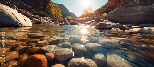 river flowing between two large rocks © ANIS