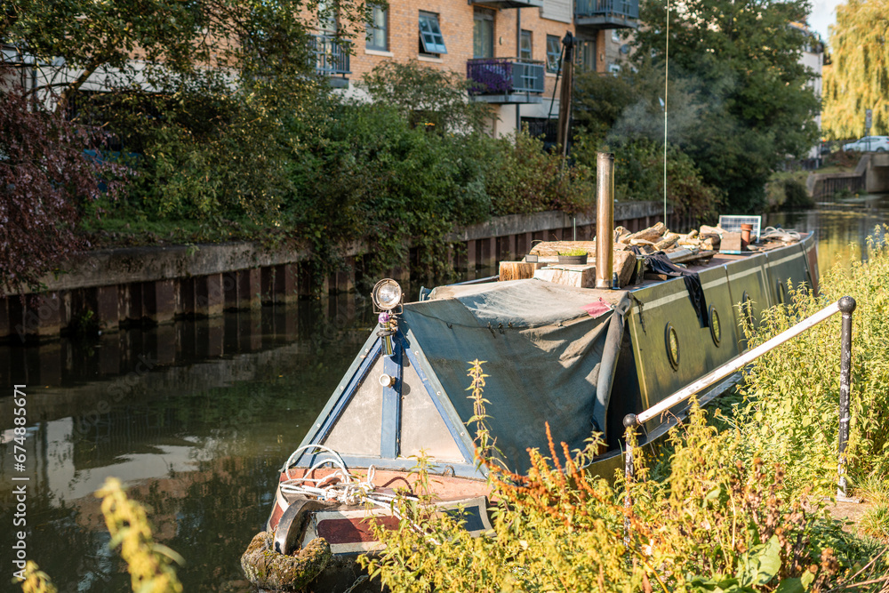 A house boat docked on Stort River in Bishop's Stortford in England A house boat docked on Stort River in Bishop's Stortford in England