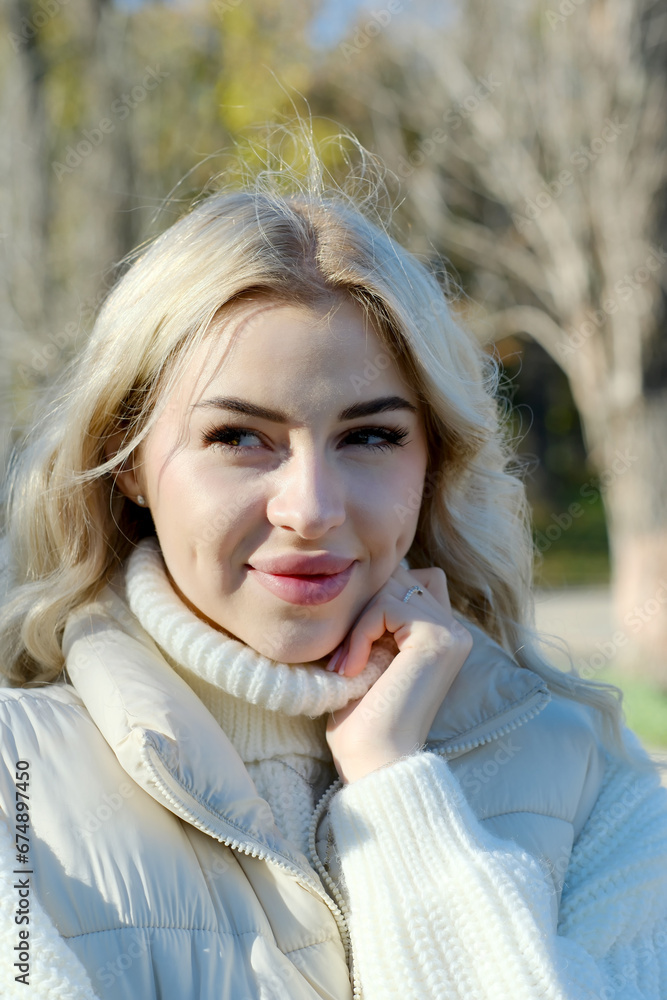 Portrait of a young beautiful blonde with long hair Portrait of a young beautiful blonde with long hair
