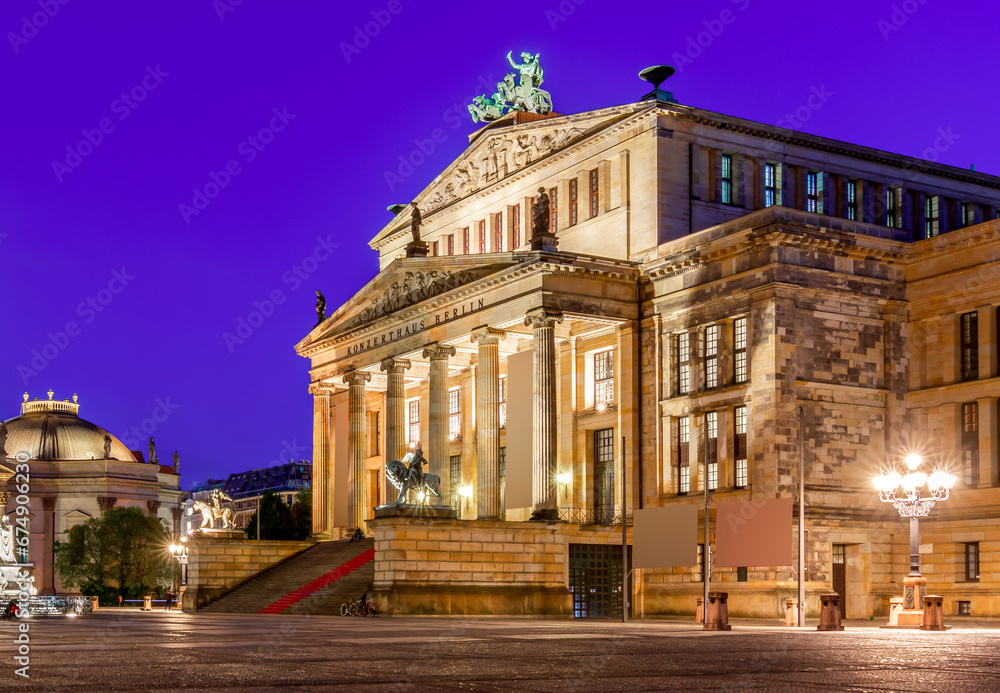 Concert Hall (Konzerthaus) and New Church (Deutscher Dom or Neue Kirche) on Gendarmenmarkt square at night in Berlin, Germany