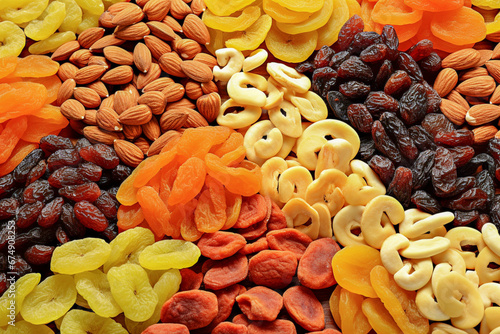 Background of delicious dried fruits and nuts photo