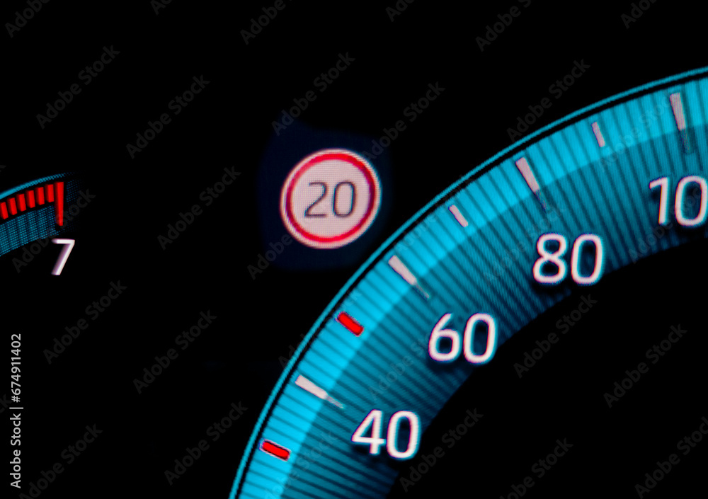 Speed limit warning close to speedometer indicator
