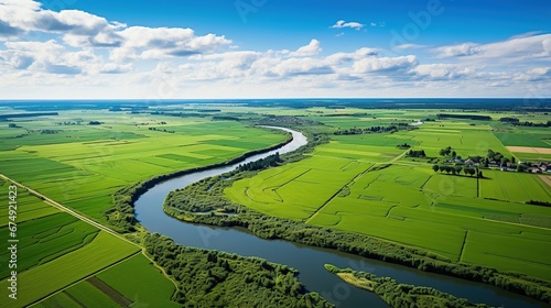 Aerial drone view of typical Dutch landscape with canals, polder water, green fields and farm houses from above, Holland, Netherlands photo