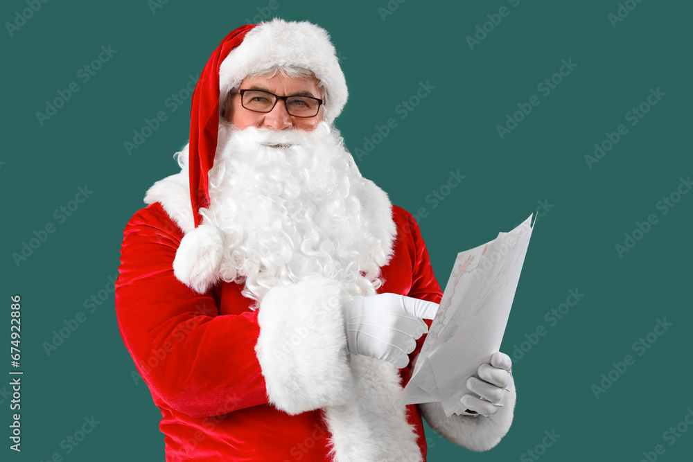 Santa Claus with letters on green background Santa Claus with letters on green background