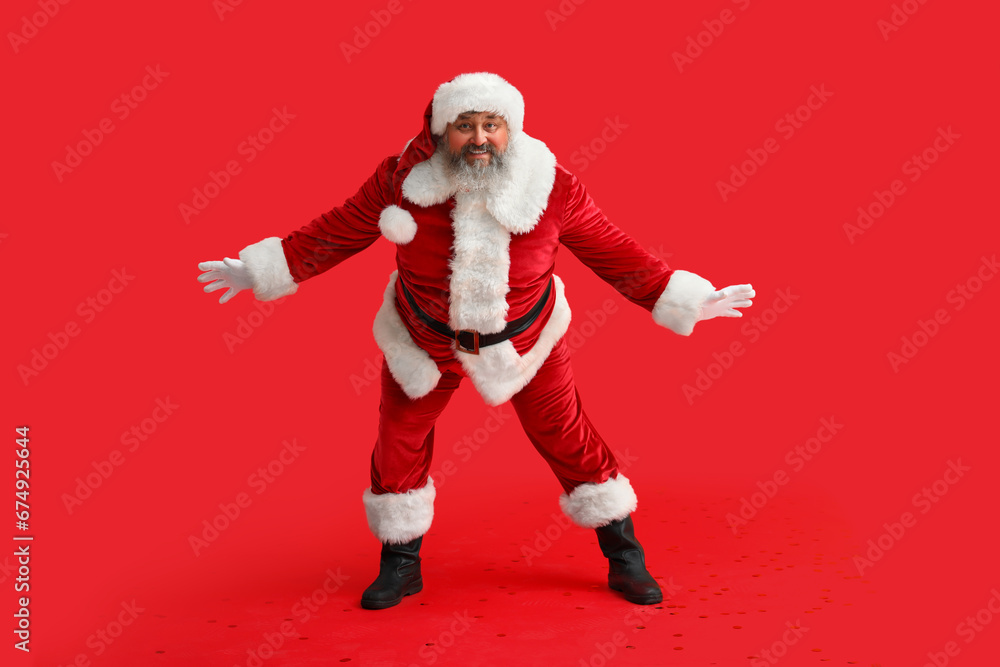 Dancing Santa Claus on red background Dancing Santa Claus on red background