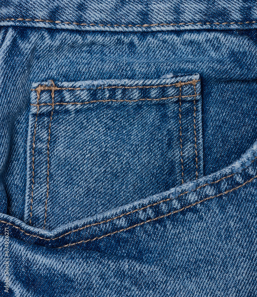 Blue jeans front pocket with buttons, close up Blue jeans front pocket with buttons, close up