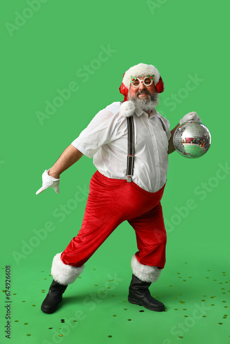 Funny Santa Claus in headph...