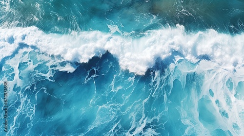 Beautiful texture of big power dark ocean waves with white wash. Aerial top view footage of fabulous sea tide on a stormy day. Drone filming breaking surf with foam in Indian ocean. Big swell in Bali. photo