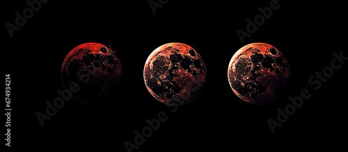 Red moon, on a black background. Elements of this image furnished NASA. High quality photo