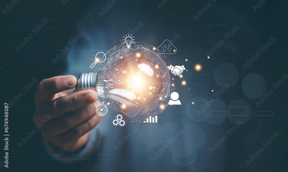 Business global internet connection application technology and digital marketing, Hand holding light bulb with innovation icon network connection, Financial and banking, Digital link tech, Big data. Business global internet connection application technology and digital marketing, Hand holding light bulb with innovation icon network connection, Financial and banking, Digital link tech, Big data.