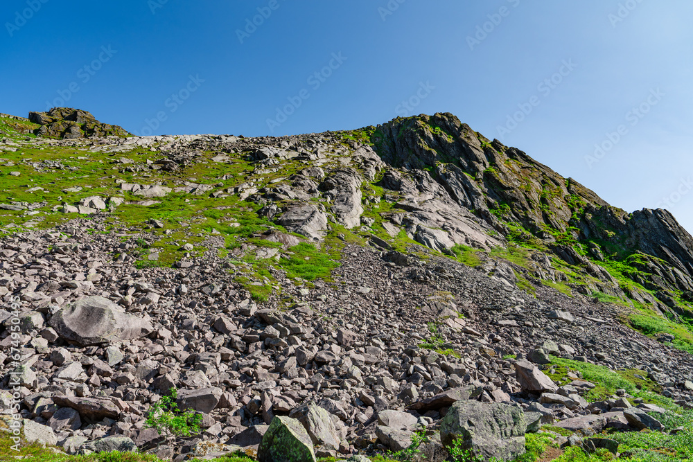 Djevelporten or Devils gate in Floya mountain hiking trail. Svolvaer trekking trail in Lofoten island, Scandinavia, Norway, activity famous places Djevelporten or Devils gate in Floya mountain hiking trail. Svolvaer trekking trail in Lofoten island, Scandinavia, Norway, activity famous places