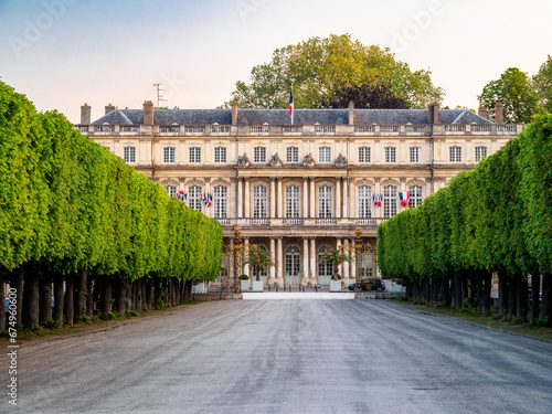 Distant view of the Palais du Gouvernement (Government Palace) with the treelined path at the Place de la Carrière, UNESCO World Heritage SIte, Nancy, Meurthe et Moselle, Lorraine, France.