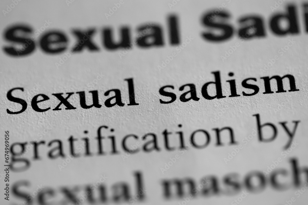 sexual sadist, psychological sexual fetish or obsession terminology printed in black on white paper close-up. medical treatment and therapy. fetish of inflicting pain sexual sadist, psychological sexual fetish or obsession terminology printed in black on white paper close-up. medical treatment and therapy. fetish of inflicting pain