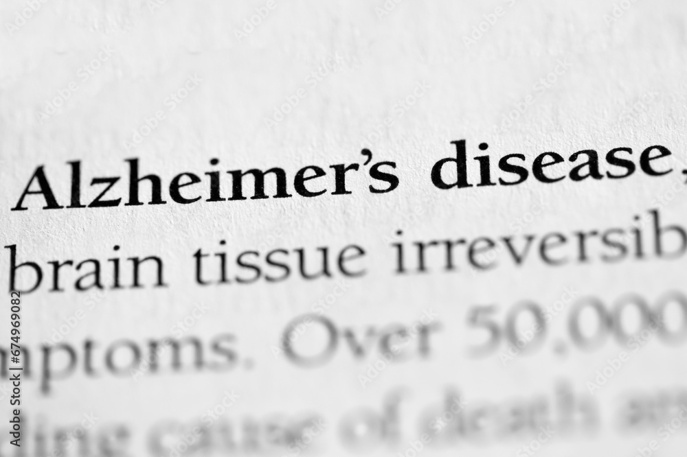 Fototapeta premium Alzheimer's disease, medical disorder terminology printed in black on white paper close-up. medical treatment and therapy found in aged or elderly