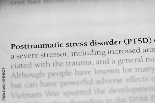 Post traumatic stress disorder PTSD  psychology disorder terminology printed in black on white paper close-up. medical treatment and therapy. 