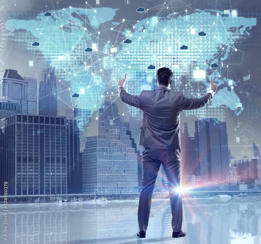 Young businessman in cloud computing concept Young businessman in cloud computing concept