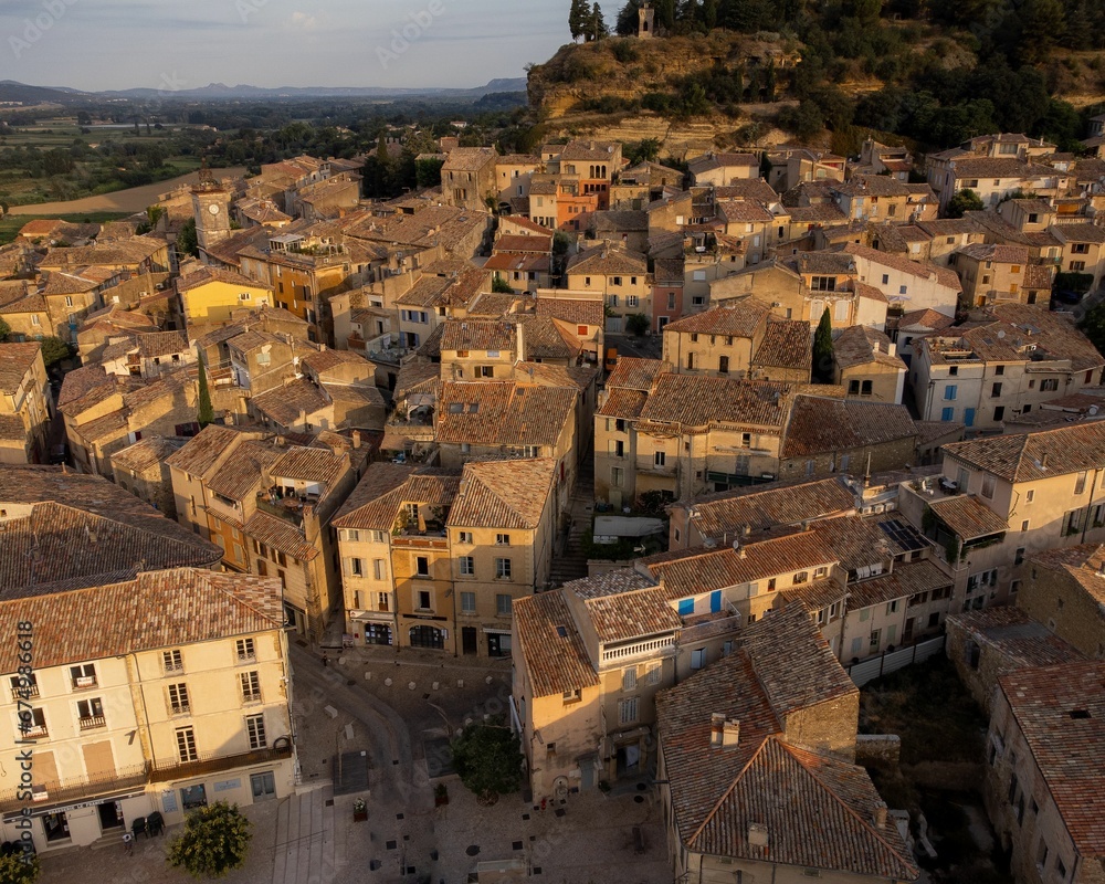 Aerial view of a small town of Cadenet, Lourmarin, France at golden hour