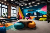 A playful and creative office with colorful bean bags and fun wall graphics.