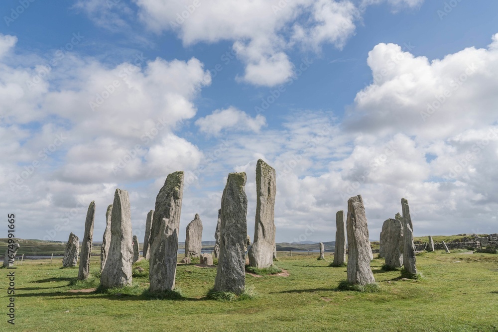 Cloudy blue sky over the Stone circle on Isle of Lewis in Scotland