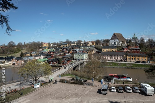 a very large parking lot that has several parked cars in it