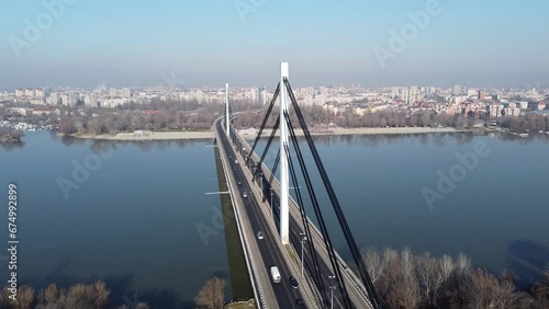 Drone view over cars driving on the Liberty Bridge in Novi Sad